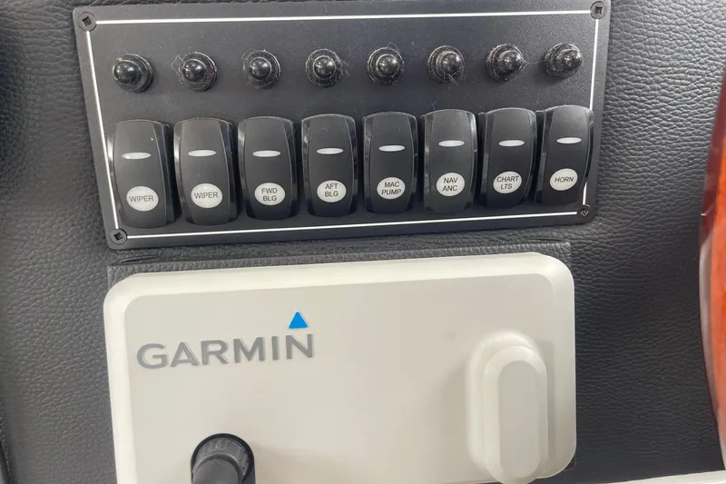 Slide: The Image of Control panel of a 2022 Cutwater C-30 Sedan with Garmin navigation system. - 58