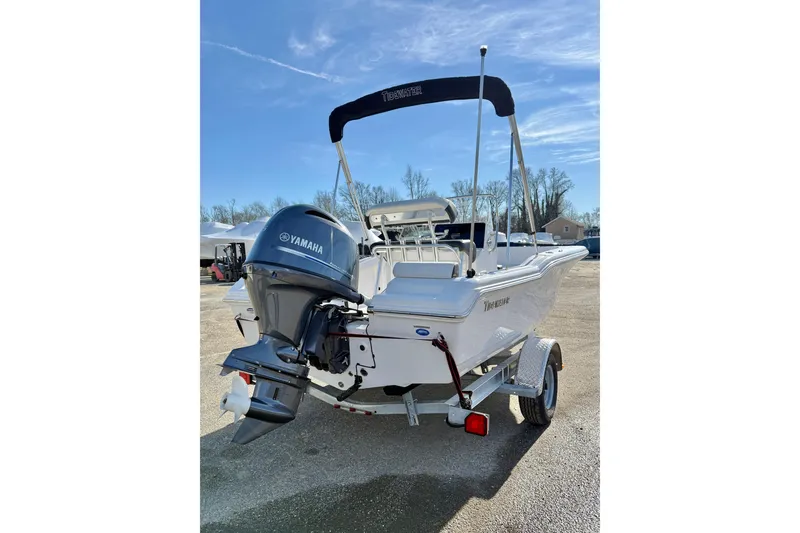 Slide: The Image of 2026 Tidewater 180 CC Adventure boat with Yamaha outboard motor, parked on a trailer. - 15