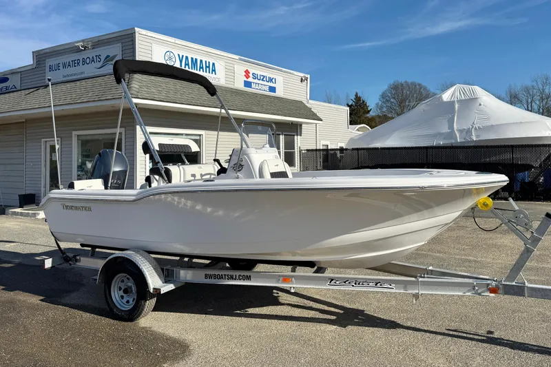 Slide: The Image of 2026 Tidewater 180 CC Adventure boat on trailer at Blue Water Boats dealership. - 17