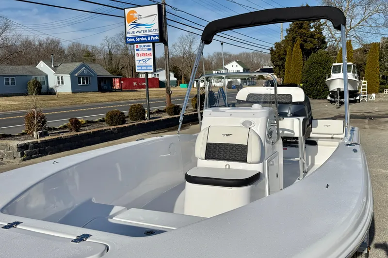 Slide: The Image of 2026 Tidewater 180 CC Adventure boat displayed at Blue Water Boats dealership. - 25