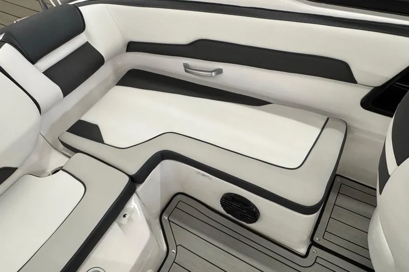 Slide: The Image of 2026 Yamaha Boats 195S interior seating with sleek black and white design. - 12