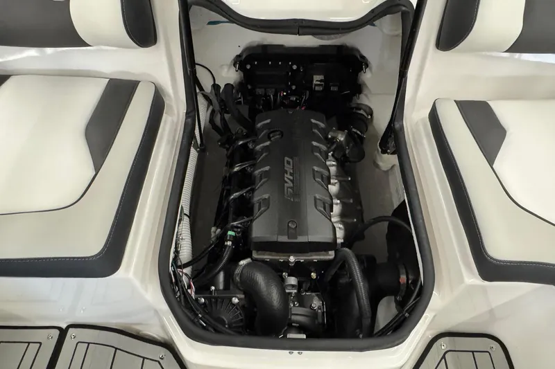 Slide: The Image of 2026 Yamaha Boats 195S engine compartment with sleek seating design. - 17