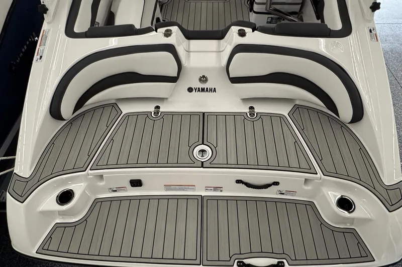 Slide: The Image of 2026 Yamaha Boats 195S, sleek deck design with cushioned seating and modern features. - 18