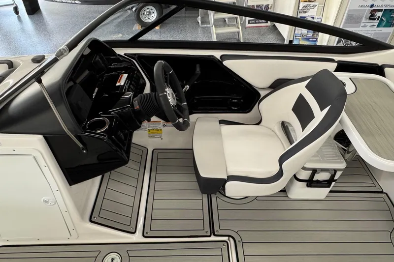 Slide: The Image of 2026 Yamaha Boats 195S interior with sleek helm and modern seating design. - 8