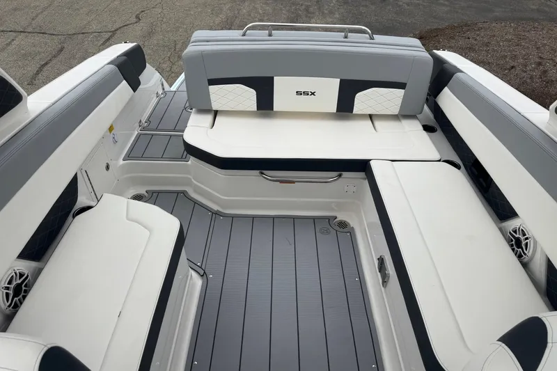 Slide: The Image of 2026 Chaparral 8 SSX boat interior with sleek seating and modern design. - 13