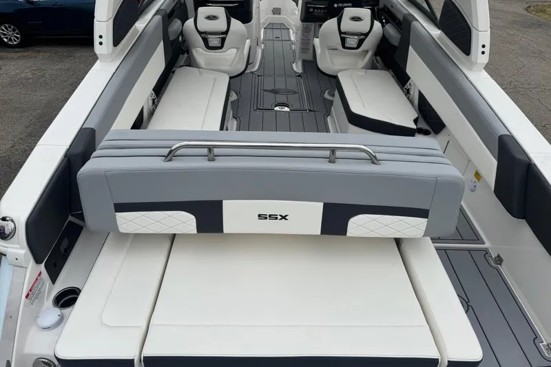 Slide: The Image of 2026 Chaparral 8 SSX boat interior with luxurious seating and modern design. - 6
