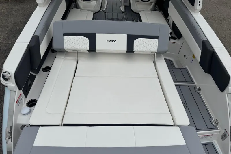 Slide: The Image of 2026 Chaparral 8 SSX boat interior with luxurious seating and modern design. - 7