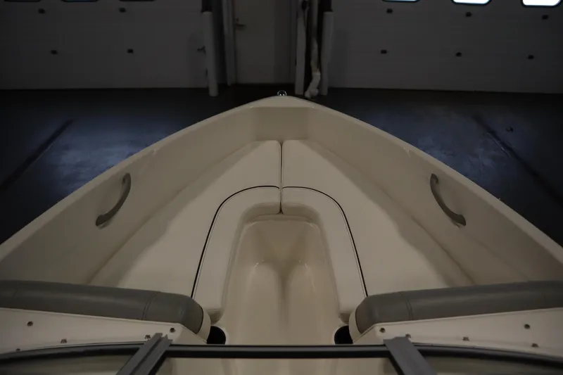 Slide: The Image of 2013 Bayliner 175 Bowrider interior view, showcasing seating and design features. - 11