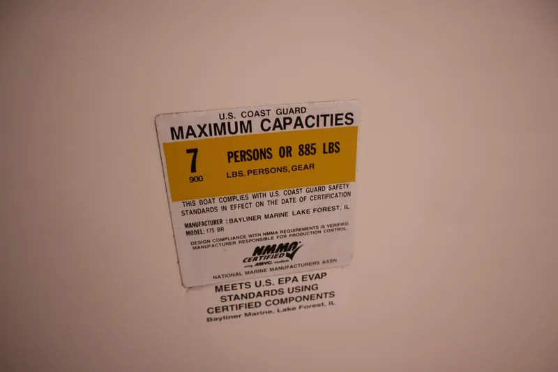 Slide: The Image of Capacity label for 2013 Bayliner 175 Bowrider, max 7 persons or 885 lbs. - 24
