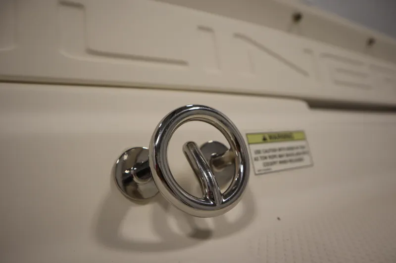 Slide: The Image of Chrome cleat on 2013 Bayliner 175 Bowrider boat, close-up view. - 34