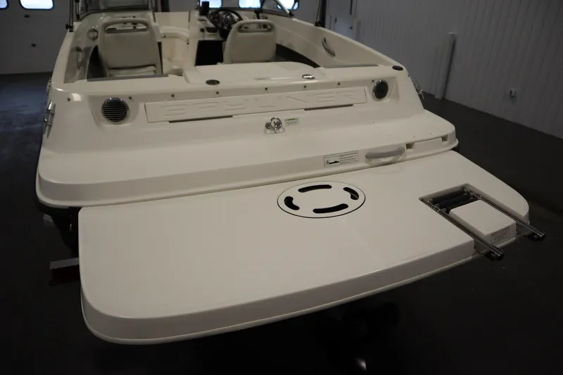 Slide: The Image of 2013 Bayliner 175 Bowrider boat, rear view with swim platform and ladder. - 35