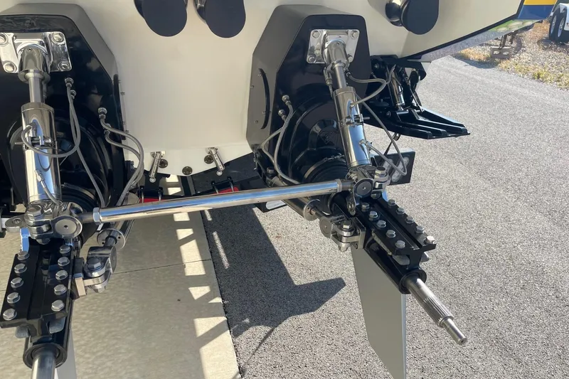 Slide: The Image of Rear view of 2004 Formula 382 FASTech boat's dual outdrive system on pavement. - 13
