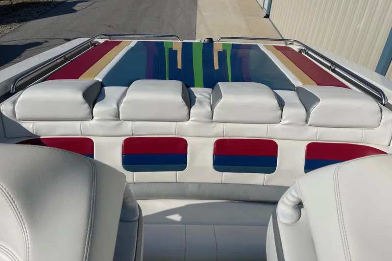 Slide: The Image of 2004 Formula 382 FASTech boat interior with colorful upholstery and sleek design. - 17