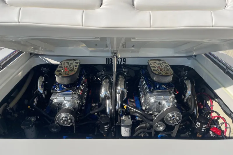 Slide: The Image of 2004 Formula 382 FASTech boat engine compartment with dual high-performance engines. - 18