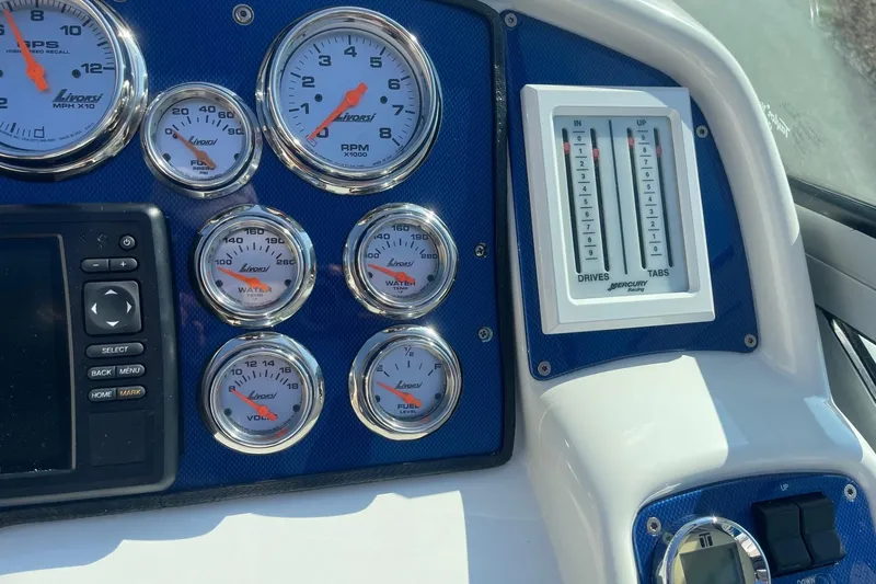 Slide: The Image of Dashboard of a 2004 Formula 382 FASTech boat with Livorsi gauges and controls. - 30