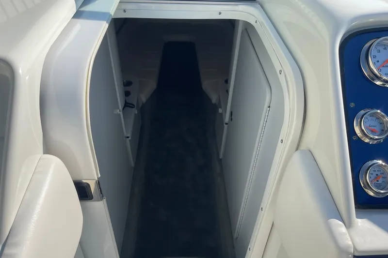 Slide: The Image of 2004 Formula 382 FASTech cabin entrance with visible gauges and sleek interior design. - 40
