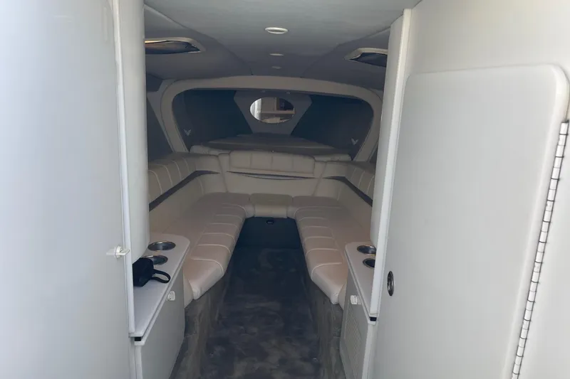 Slide: The Image of Interior of 2004 Formula 382 FASTech boat, featuring plush seating and modern design. - 41