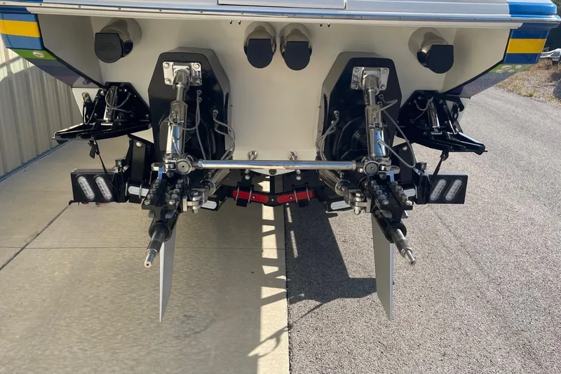 Slide: The Image of Rear view of a 2004 Formula 382 FASTech boat showing dual outdrives and propellers. - 7