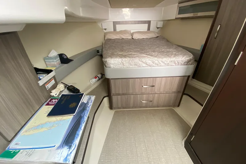 Slide: The Image of Display screen showing 116 engine hours and GPS coordinates on a 2022 Regal 36 XO. - 18