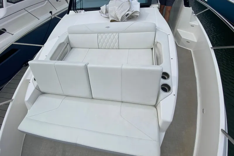 Slide: The Image of Anchor compartment of 2022 Regal 36 XO boat, featuring a windlass system. - 5