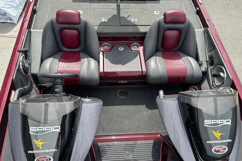 Slide: The Image of 2015 Ranger Z119 Comanche boat interior with dual seats and Humminbird electronics. - 10