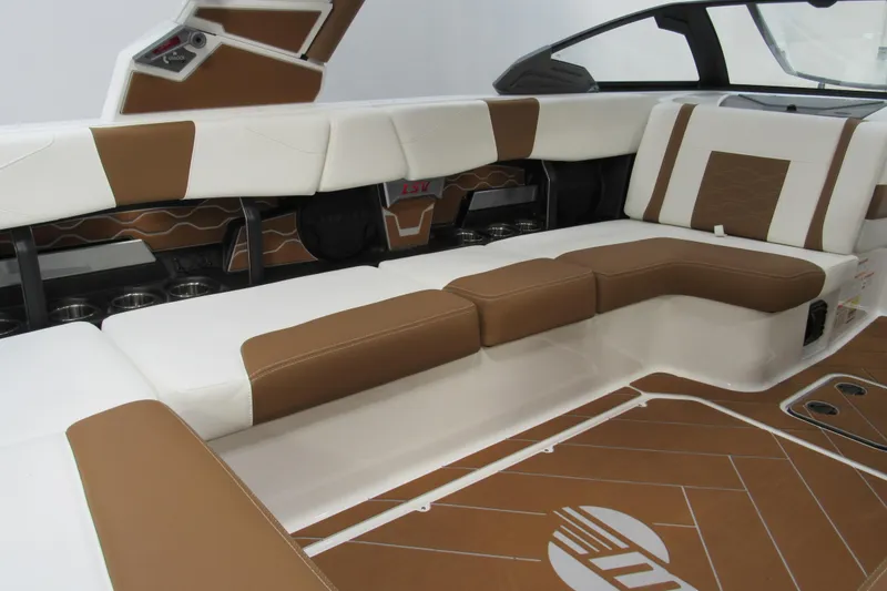 Slide: The Image of 2026 Malibu Wakesetter 23 LSV interior with brown and white seating, modern design. - 4