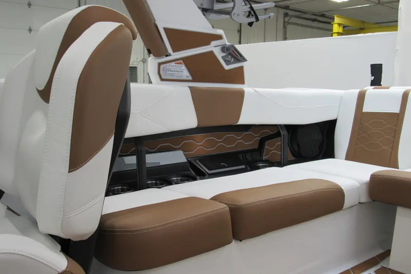 Slide: The Image of 2026 Malibu Wakesetter 23 LSV interior with brown and white leather seating. - 8