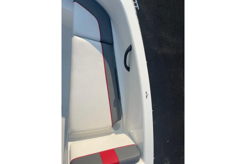 Slide: The Image of 2021 Tahoe T-16 boat interior with white and red cushioned seating. - 18