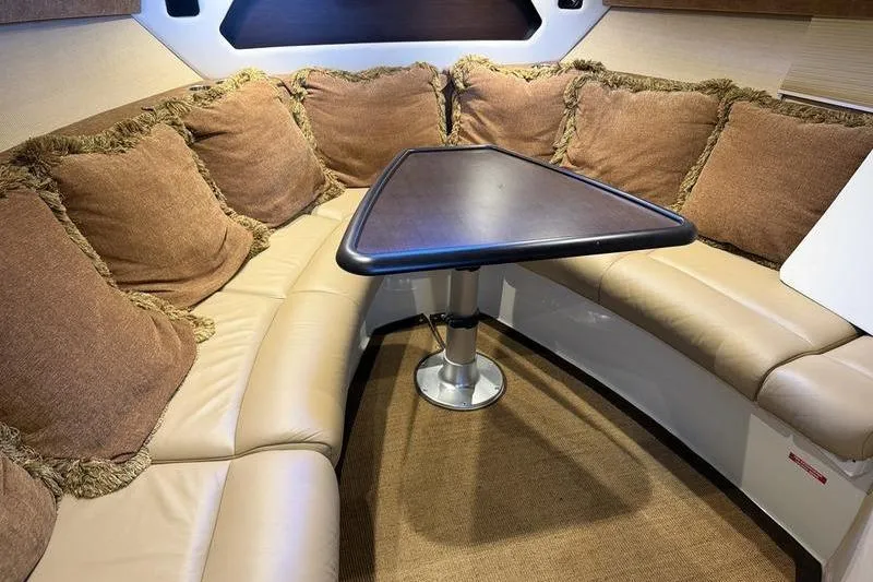 Slide: The Image of Luxurious 2015 Cobalt A40 boat interior with plush seating and elegant table. - 17