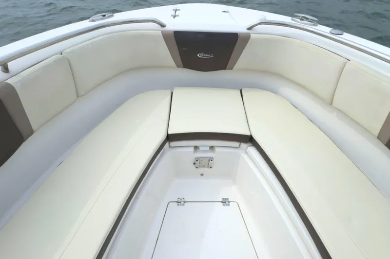 Slide: The Image of 2019 Robalo R272 Center Console boat with spacious seating and storage. - 28