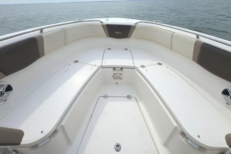 Slide: The Image of 2019 Robalo R272 Center Console boat interior with spacious seating and ocean view. - 29