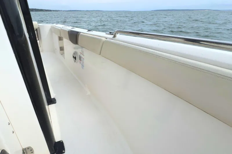 Slide: The Image of 2019 Robalo R272 Center Console boat interior with ocean view. - 34