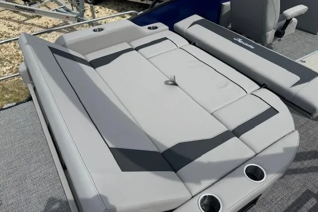 Slide: The Image of 2026 Barletta ARIA 22UC boat interior with gray seating and cup holders. - 20