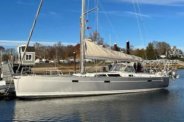 The Image of 2008 Hanse 470e sailboat docked in a serene marina setting. - 0