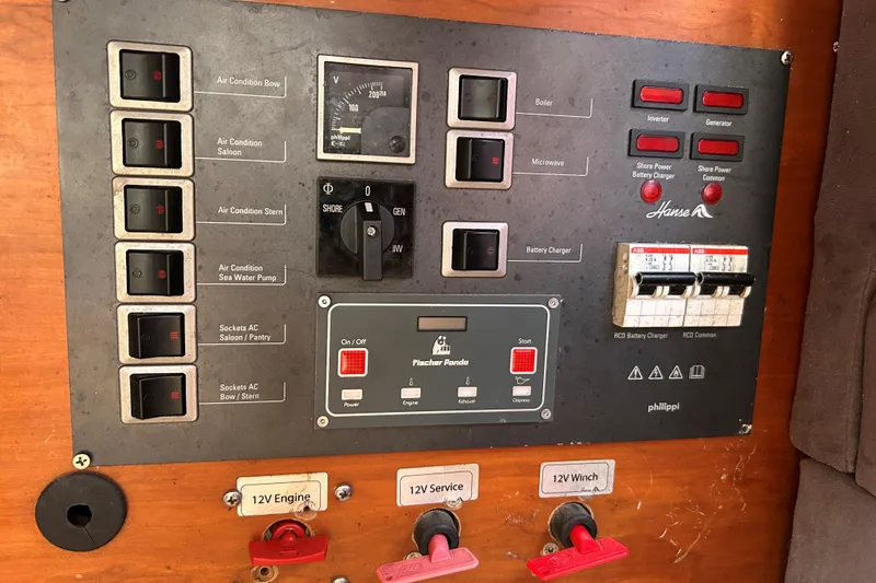 Slide: The Image of Cozy cabin interior of 2008 Hanse 470e yacht with wooden finish and plush bedding. - 15