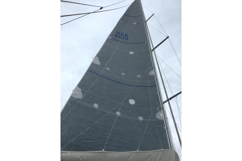 Slide: The Image of Engine compartment of a 2008 Hanse 470e sailboat, showcasing mechanical components and insulation. - 27