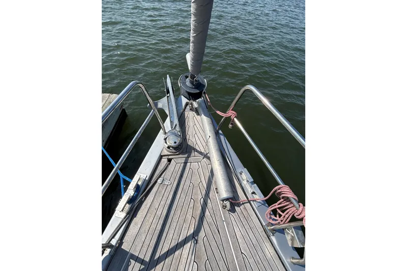Slide: The Image of 2008 Hanse 470e yacht cockpit with dual steering wheels and deck equipment. - 6