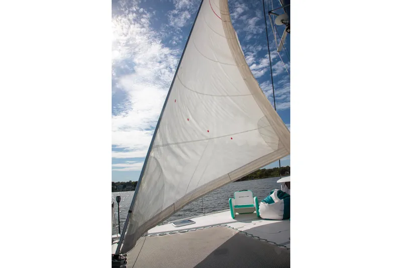 Slide: The Image of Sailing on a 2018 Fountaine Pajot Helia 44 Evolution catamaran under a clear sky. - 11