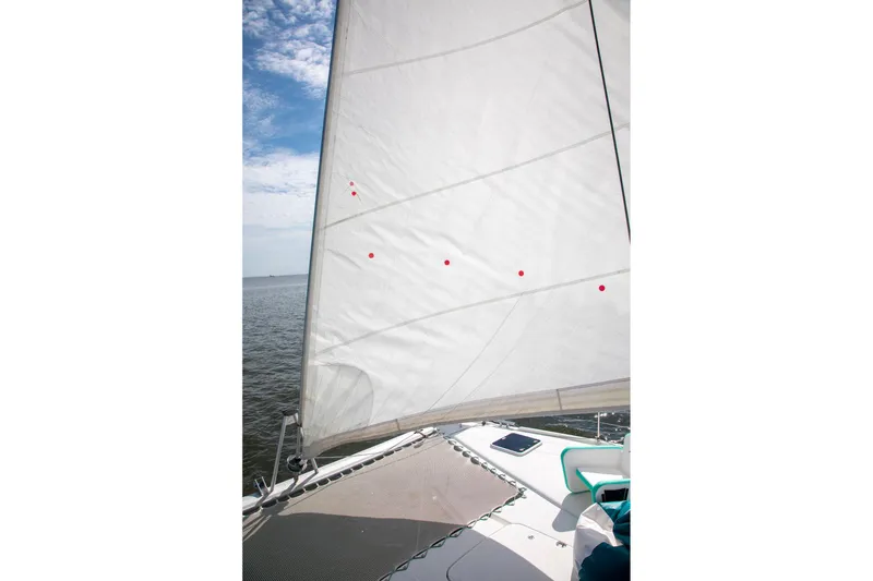 Slide: The Image of Sailing on a 2018 Fountaine Pajot Helia 44 Evolution catamaran with clear skies. - 12