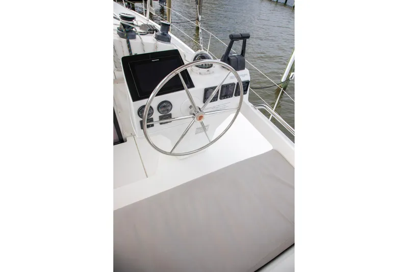 Slide: The Image of Helm of 2018 Fountaine Pajot Helia 44 Evolution catamaran with steering wheel and navigation instruments. - 16