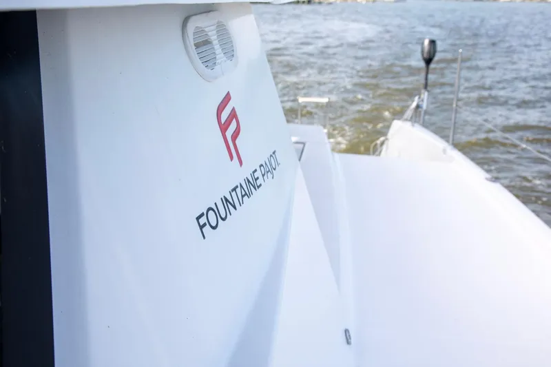 Slide: The Image of Fountaine Pajot Helia 44 Evolution 2018 catamaran on water, showcasing sleek design. - 20