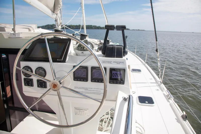 Slide: The Image of Helm of 2018 Fountaine Pajot Helia 44 Evolution catamaran with navigation instruments. - 25