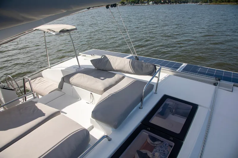 Slide: The Image of Luxurious 2018 Fountaine Pajot Helia 44 Evolution catamaran with spacious deck and comfortable seating. - 26