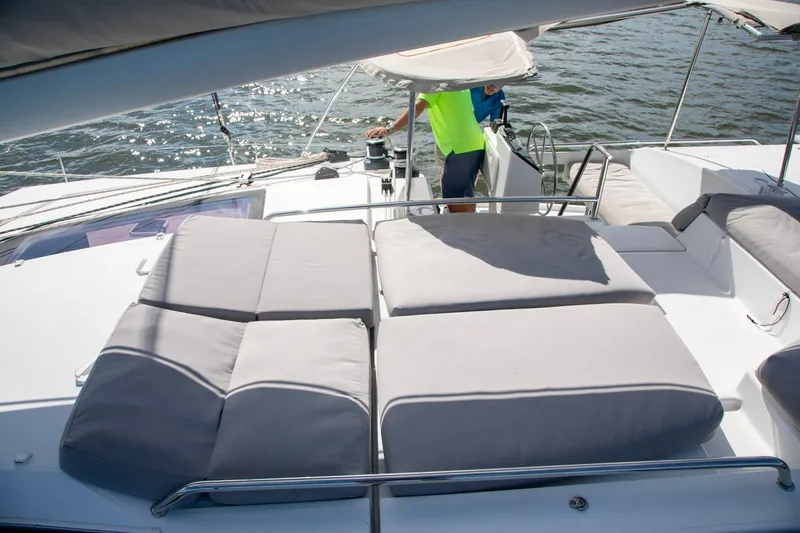 Slide: The Image of 2018 Fountaine Pajot Helia 44 Evolution yacht with spacious sunbathing area and helm station. - 27