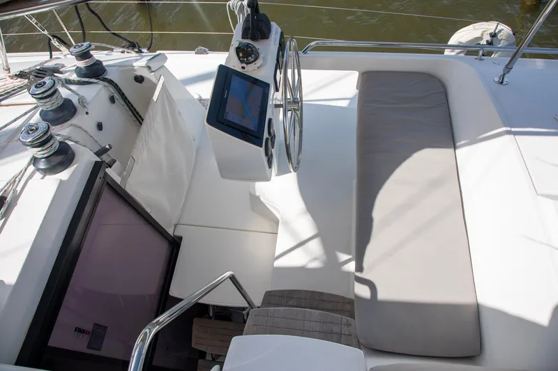 Slide: The Image of Helm station of 2018 Fountaine Pajot Helia 44 Evolution catamaran with navigation equipment. - 37