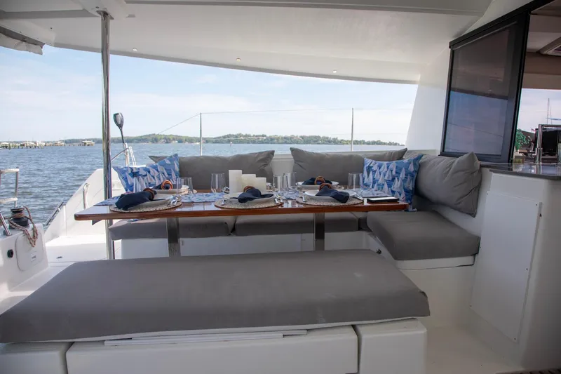 Slide: The Image of Luxurious 2018 Fountaine Pajot Helia 44 Evolution yacht with elegant outdoor dining setup. - 40