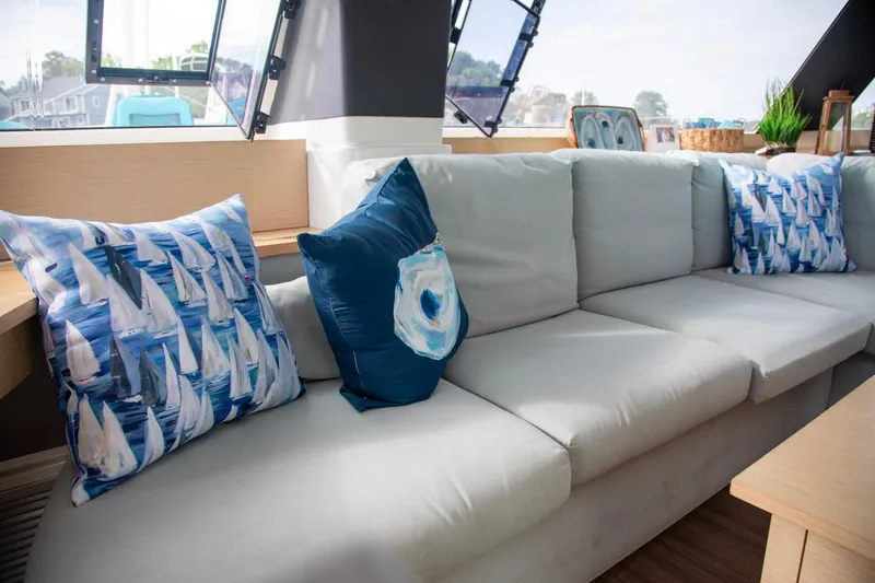 Slide: The Image of Luxurious interior of 2018 Fountaine Pajot Helia 44 Evolution with nautical-themed cushions. - 43