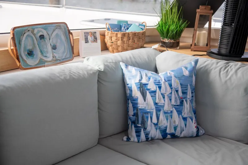 Slide: The Image of Cozy interior of 2018 Fountaine Pajot Helia 44 Evolution with nautical-themed pillow. - 45