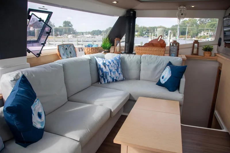 Slide: The Image of Interior of 2018 Fountaine Pajot Helia 44 Evolution catamaran with cozy seating and nautical decor. - 47