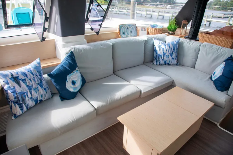 Slide: The Image of Luxurious interior of 2018 Fountaine Pajot Helia 44 Evolution catamaran with cozy seating and nautical decor. - 49